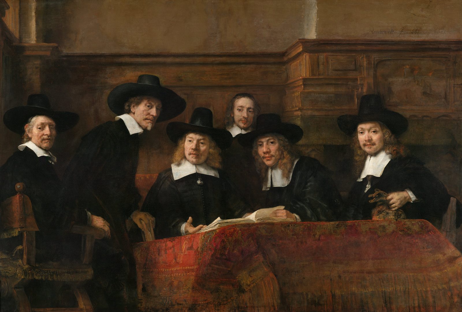 Rembrandt's group portrait of five cloth guild officials seated at a table covered with a red carpet, an open ledger in front of them. All five have turned to look directly out of the painting.